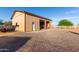 Metal garage with two open bays, offering ample parking and storage space with exterior door at 8351 S Summit Dr, Casa Grande, AZ 85193