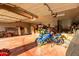 Spacious garage with ample storage, featuring a motorcycle and overhead lighting at 8351 S Summit Dr, Casa Grande, AZ 85193