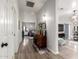 Hallway featuring wood floors and an open view into a bedroom and living area at 8351 S Summit Dr, Casa Grande, AZ 85193