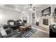 Inviting living room with fireplace, comfortable seating, and contemporary decor at 8351 S Summit Dr, Casa Grande, AZ 85193
