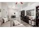 Spacious living room boasts stylish furniture, ceiling fan, and contemporary flooring at 8351 S Summit Dr, Casa Grande, AZ 85193