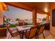 Covered patio with outdoor dining area, overlooking the playground and fenced backyard at 8351 S Summit Dr, Casa Grande, AZ 85193