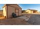 Storage shed with chair and stepping stones near a barn at 8351 S Summit Dr, Casa Grande, AZ 85193