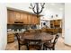 This open-concept kitchen has custom cabinets, granite counters, stainless steel appliances, and room to gather at 10010 E Blue Sky Dr, Scottsdale, AZ 85262