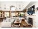 Spacious living room with high ceilings, tile floors, and comfortable seating arrangement at 10010 E Blue Sky Dr, Scottsdale, AZ 85262
