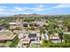 An aerial perspective highlights the backyard oasis with pool and solar panels at 101 E Linger Ln, Phoenix, AZ 85020