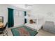 bedroom with bunk beds, custom window treatments, and unique area rug at 101 E Linger Ln, Phoenix, AZ 85020