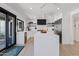 Stylish kitchen featuring a large island, stainless steel appliances, and modern cabinetry at 101 E Linger Ln, Phoenix, AZ 85020