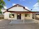 Backyard with mature trees, patio, and fence at 10242 N 66Th Ave, Glendale, AZ 85302