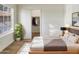 Cozy bedroom featuring a large window, closet, neutral walls, and plush carpet at 10242 N 66Th Ave, Glendale, AZ 85302