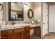 Bathroom featuring a sink with vanity, natural lighting, and modern finishes at 12725 W Forest Pleasant Pl, Peoria, AZ 85383