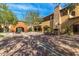 Spacious courtyard featuring decorative brick paving, archways, and outdoor seating at 12725 W Forest Pleasant Pl, Peoria, AZ 85383