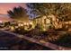 Desert landscaping in front yard, accented by a mature shade tree at 12725 W Forest Pleasant Pl, Peoria, AZ 85383