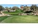 Scenic view of a well-maintained golf course with lush green fairways and mature trees at 12725 W Forest Pleasant Pl, Peoria, AZ 85383