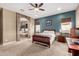 The primary bedroom has stone details and an ensuite bathroom at 12725 W Forest Pleasant Pl, Peoria, AZ 85383