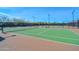 Well-maintained tennis courts with green playing surface and surrounding fencing at 12725 W Forest Pleasant Pl, Peoria, AZ 85383