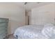 Relaxing bedroom with ceiling fan, natural lighting, and light-colored walls at 18388 W Ida Ln, Surprise, AZ 85387