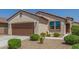 Charming single-Gathering home featuring a two-car garage and desert landscaping at 18388 W Ida Ln, Surprise, AZ 85387