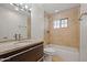 Well-lit bathroom with granite countertop, tiled shower, and modern fixtures at 1850 E Maryland Ave # 18, Phoenix, AZ 85016