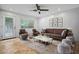 Cozy living room with a comfortable sofa, stylish armchairs, a neutral color palette, and an inviting atmosphere at 1850 E Maryland Ave # 18, Phoenix, AZ 85016