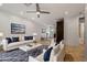 Inviting living room with a white sofa set, elegant décor, area rug, and plenty of room for entertaining at 1850 E Maryland Ave # 18, Phoenix, AZ 85016