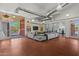 Lounge area with comfortable seating, a TV, and access to the outside at 1850 E Maryland Ave # 18, Phoenix, AZ 85016