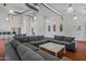 Large sectional sofa in a community lounge area with a coffee table at 1850 E Maryland Ave # 18, Phoenix, AZ 85016