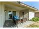 Covered patio with outdoor seating, perfect for relaxing and entertaining outdoors at 18842 N Lakeforest Dr, Sun City, AZ 85373