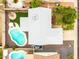 This aerial view showcases a backyard with a beautiful pool, pristine landscaping and a covered patio at 19414 N 3Rd Ave, Phoenix, AZ 85027