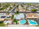 Beautiful backyard with refreshing pool, covered patio, lush greenery, and a cozy seating area perfect for entertaining at 19414 N 3Rd Ave, Phoenix, AZ 85027