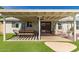 Charming covered patio with comfortable seating and a dining table, perfect for outdoor dining at 19414 N 3Rd Ave, Phoenix, AZ 85027