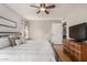 Bedroom with a full bed, wall decor and a view of the outdoor pool at 19414 N 3Rd Ave, Phoenix, AZ 85027