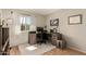 Office setup with desk, computer, and a large window at 19414 N 3Rd Ave, Phoenix, AZ 85027