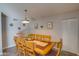 Cozy dining room featuring a large table with seating for eight, ideal for Gathering meals and gatherings at 19849 N 33Rd Ave, Phoenix, AZ 85027