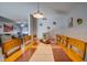 Bright dining area featuring a wooden table and chairs, open to the living space at 19849 N 33Rd Ave, Phoenix, AZ 85027