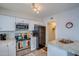 Functional kitchen with white cabinets, granite counters, stainless steel appliances and eat in bar at 19849 N 33Rd Ave, Phoenix, AZ 85027