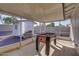 Enclosed patio featuring a foosball table and outdoor space with a shed at 19849 N 33Rd Ave, Phoenix, AZ 85027