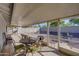 Enclosed patio featuring an outdoor dining space and fenced-in backyard at 19849 N 33Rd Ave, Phoenix, AZ 85027