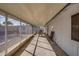 Long, enclosed patio featuring an outdoor dining space, shed, and backyard views at 19849 N 33Rd Ave, Phoenix, AZ 85027