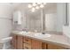 Bathroom featuring a double vanity, ample counter space and a walk-in shower at 201 S Greenfiled Rd -- # 199, Mesa, AZ 85206