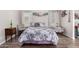 Bedroom filled with natural light, hardwood floors, and soft decor at 201 S Greenfiled Rd -- # 199, Mesa, AZ 85206