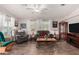 Inviting living room with wood-look floors, neutral colors, and cozy seating at 201 S Greenfiled Rd -- # 199, Mesa, AZ 85206