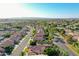 Community aerial featuring well-kept homes, palms, and tree lined streets under a clear sky at 2224 W Olive Way, Chandler, AZ 85248