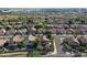 Aerial view of a suburban neighborhood with diverse home styles and mature landscaping at 2224 W Olive Way, Chandler, AZ 85248