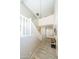 Inviting foyer boasts soaring ceilings and a stylish chandelier, creating a grand entrance at 2224 W Olive Way, Chandler, AZ 85248