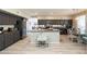 Open kitchen with granite countertops, stainless steel appliances, a breakfast nook, and lots of cabinet space at 2224 W Olive Way, Chandler, AZ 85248