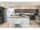 Open kitchen with granite countertops, stainless steel appliances, a breakfast nook, and lots of cabinet space at 2224 W Olive Way, Chandler, AZ 85248