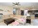 Comfortable living room showcasing an open layout, a fireplace, and a cozy sectional sofa at 2224 W Olive Way, Chandler, AZ 85248