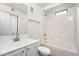 Bright bathroom features a shower-tub combo with white tile surround and a single sink vanity at 2401 E Rio Salado Pkwy # 1055, Tempe, AZ 85288