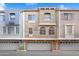 Multi-tone townhouse exterior with two stories, garage, and address numbers at 2401 E Rio Salado Pkwy # 1055, Tempe, AZ 85288